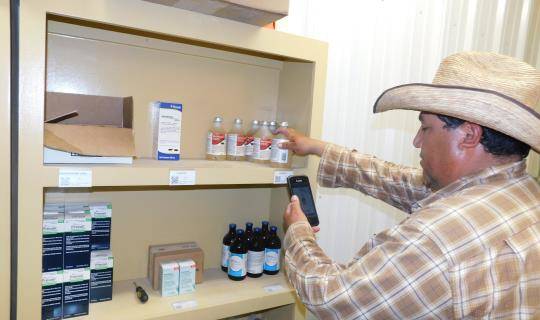 Feedyard manager scans product